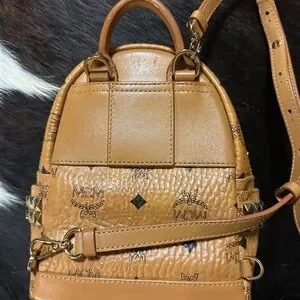 MCM Tan Backpack with Signature Monogram and Studded Accents MCM | Bags | Mcm Tan Backpack With Signature Monogram And  main image 2